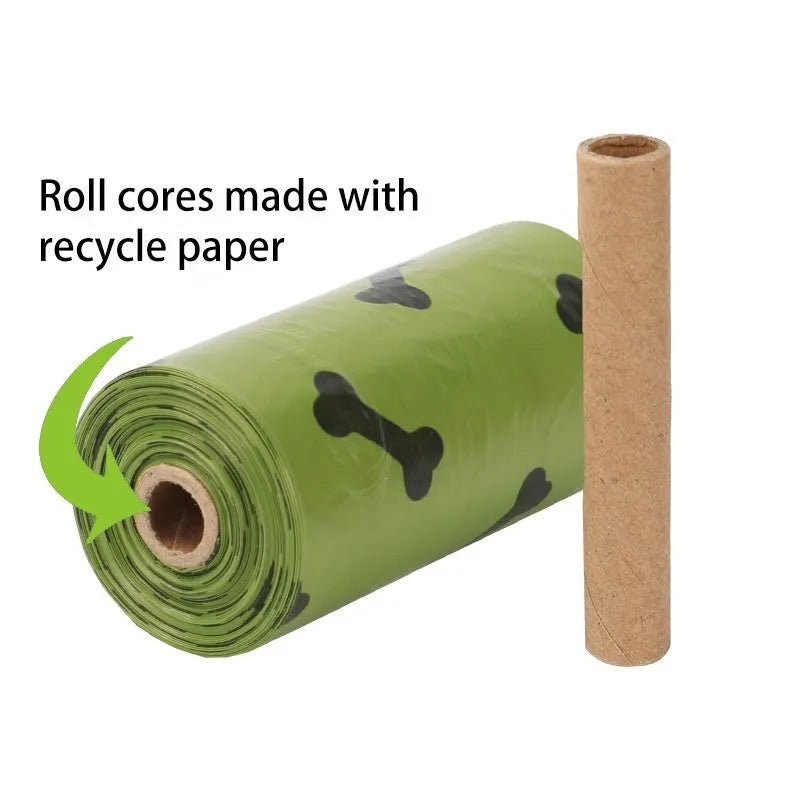 Roll of army green degradable dog poop bags with black bone print, showing bag size scale