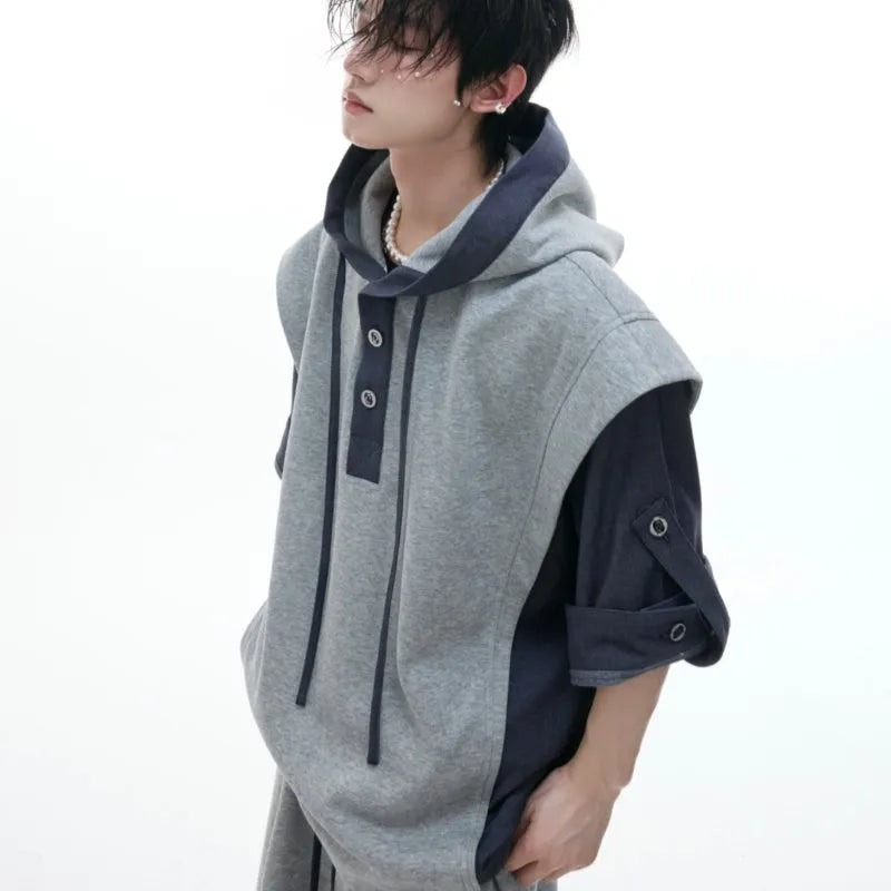 Men's black polyester hooded jacket with three-dimensional stitching on sleeves, paired with matching trousers