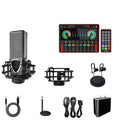 G4 professional sound card set with mixer, large diaphragm microphone, remote control, and audio cables on a desk.