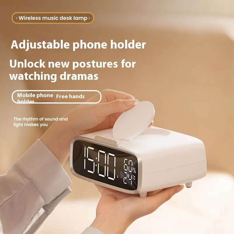 White wireless charger with Bluetooth speaker and night light on bedside table