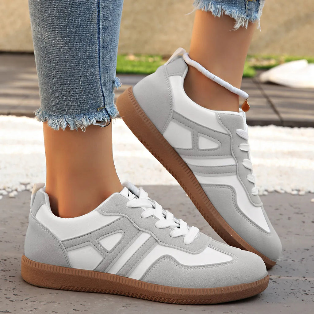 Women's retro lace-up jogging shoes in black, grey, or khaki with a platform heel and rubber sole.