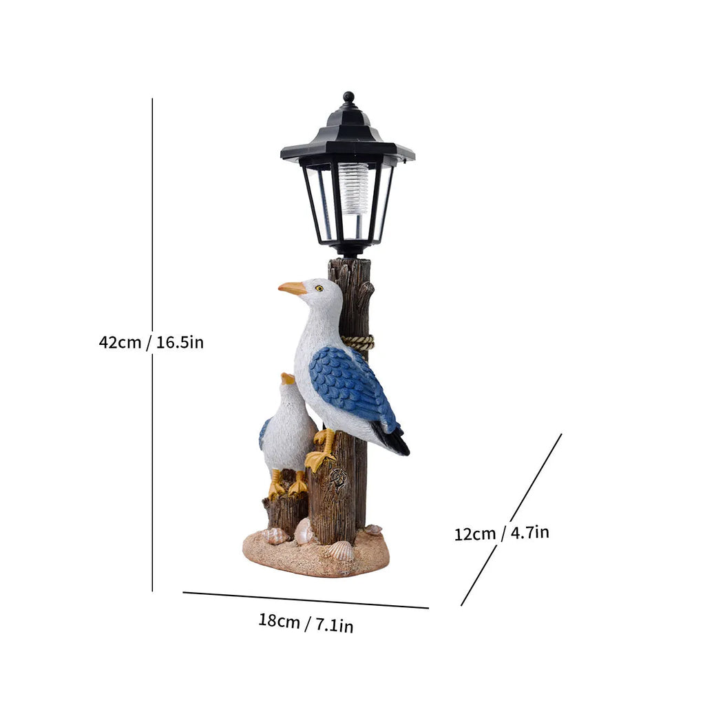 Solar hexagonal garden lamp with resin sculpture decoration in garden setting