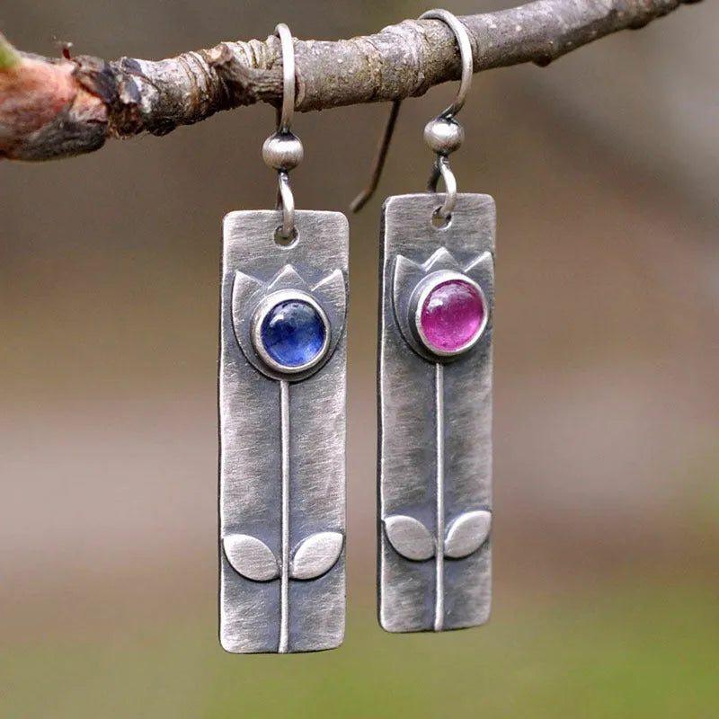 Antique finish red sapphire earrings with geometric shape and ellipse elements in retro style