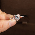 Heart-shaped women's fashion ring with crystal details in rose gold or silvery electroplated finish.