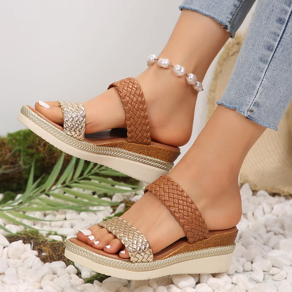 Women's metallic gold wedge sandals with adjustable strap and rubber wedge sole
