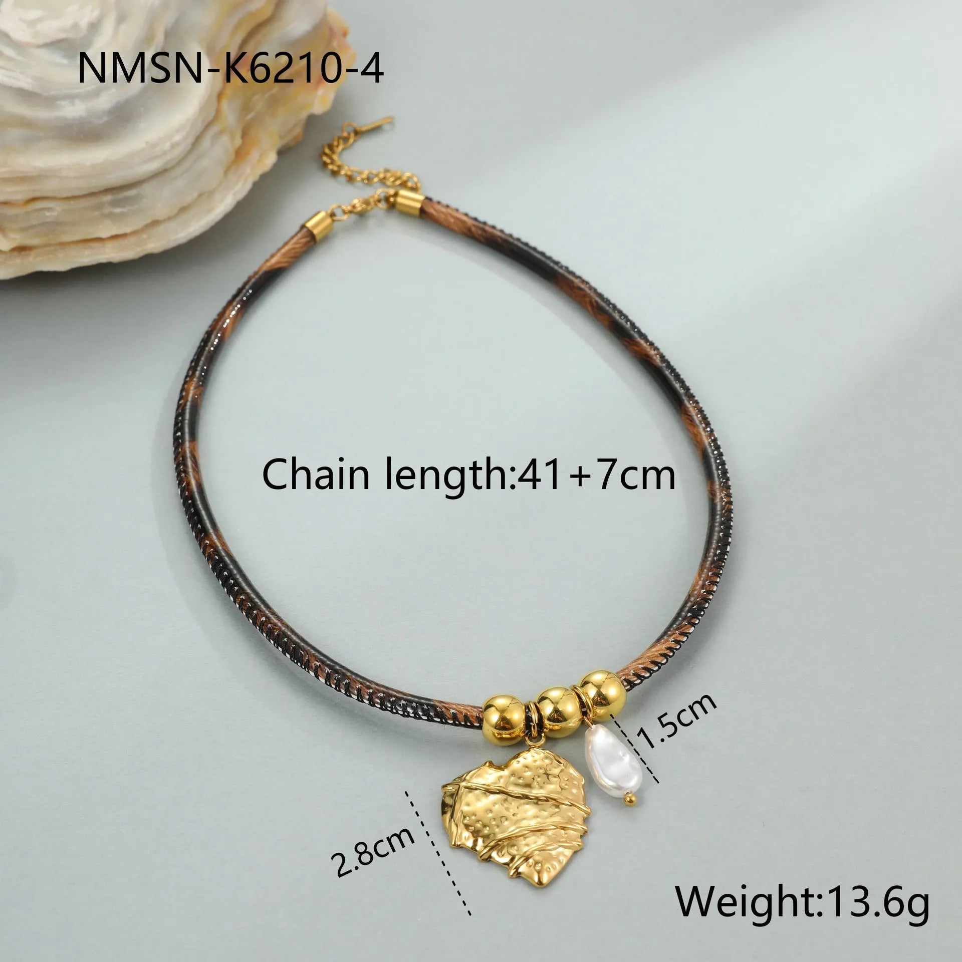Geometric leopard pendant necklace on a stainless steel chain with adjustable length between 41cm and 50cm.