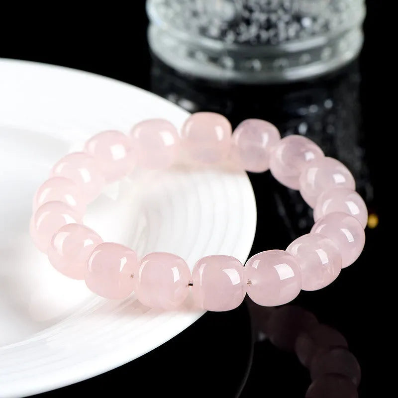 Pink crystal barrel bead bracelet with 11-12mm geometric beads and original design