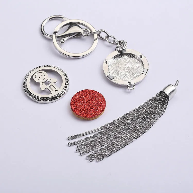 Alloy metal aromatherapy car pendant on a 50cm chain, showing 12mm round scent box, 28mm size.