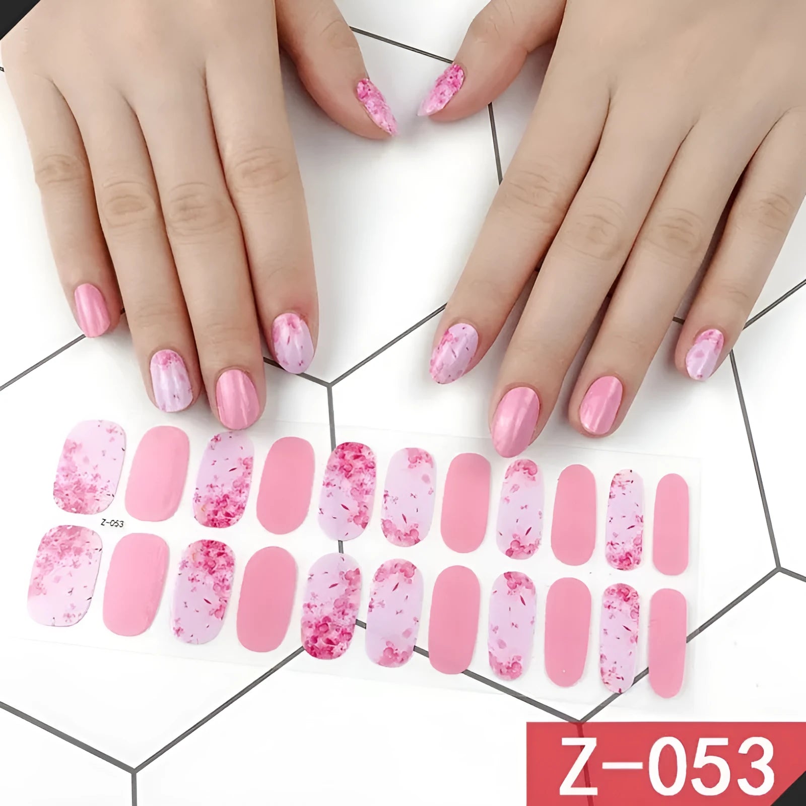 Pack of Korean nail stickers showing cartoon, strawberry, flower, and shell designs with a nail file.