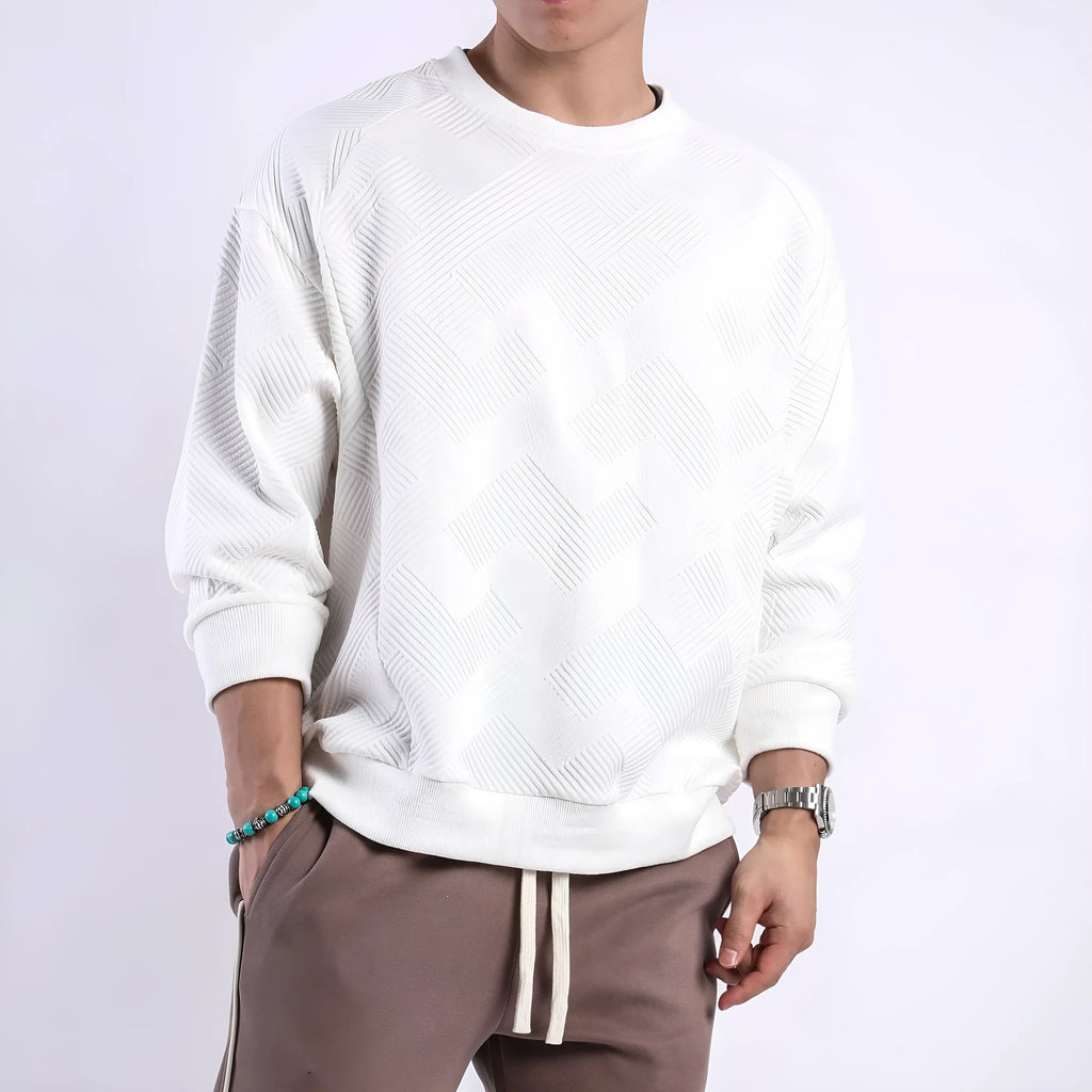 Men's solid colour twill jacquard long sleeve pullover sweater on a hanger.