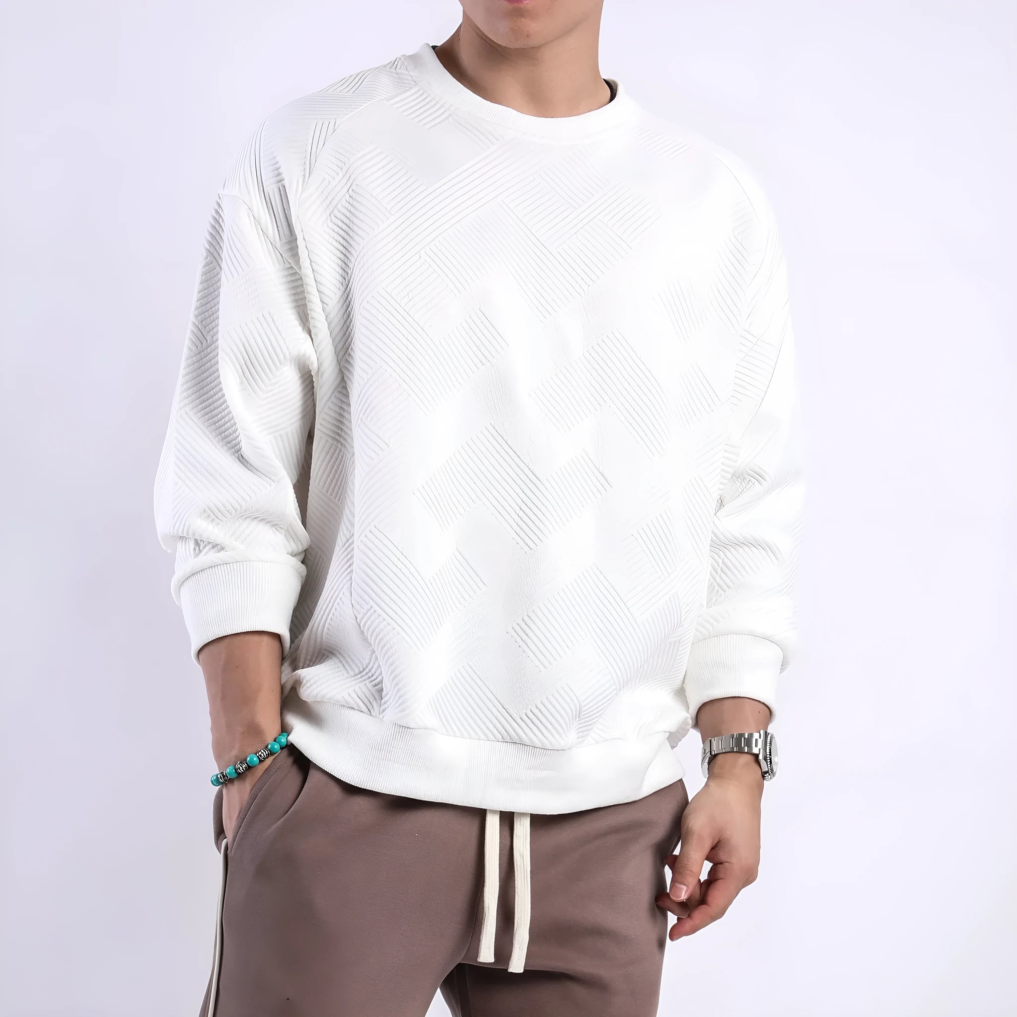 Men's solid colour twill jacquard long sleeve pullover sweater on a hanger.