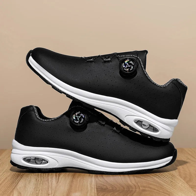 Black and white low top mesh tennis shoes with composite sole and cross shoulder straps