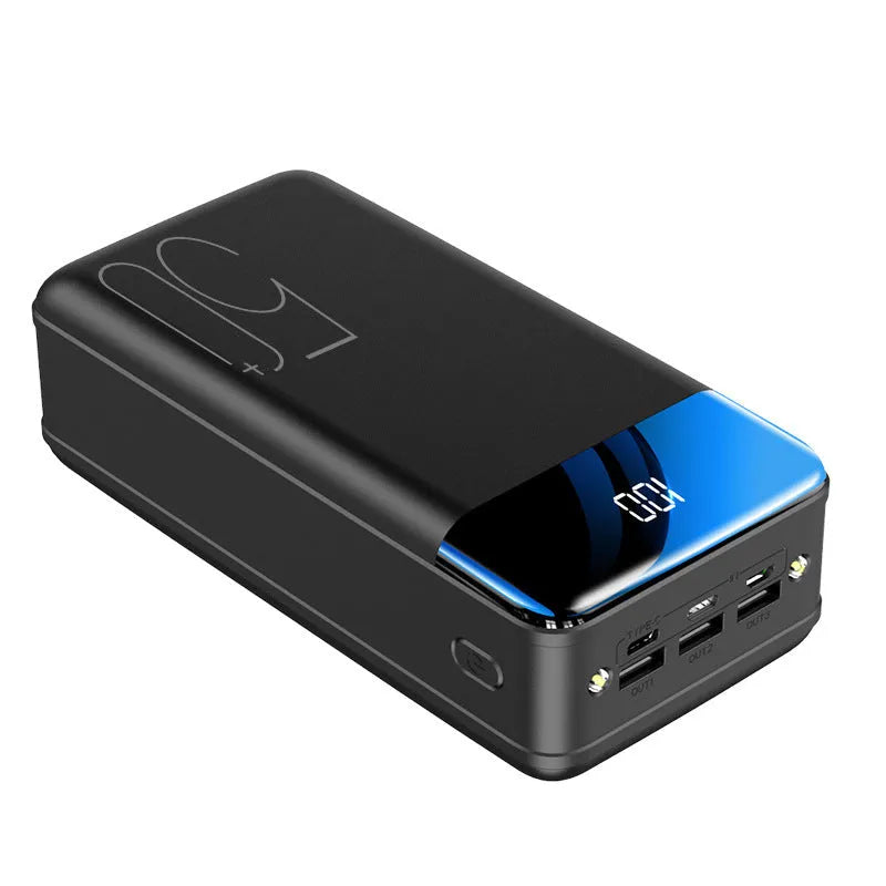 Black or white 50000mAh power bank with three USB output ports showing size scale