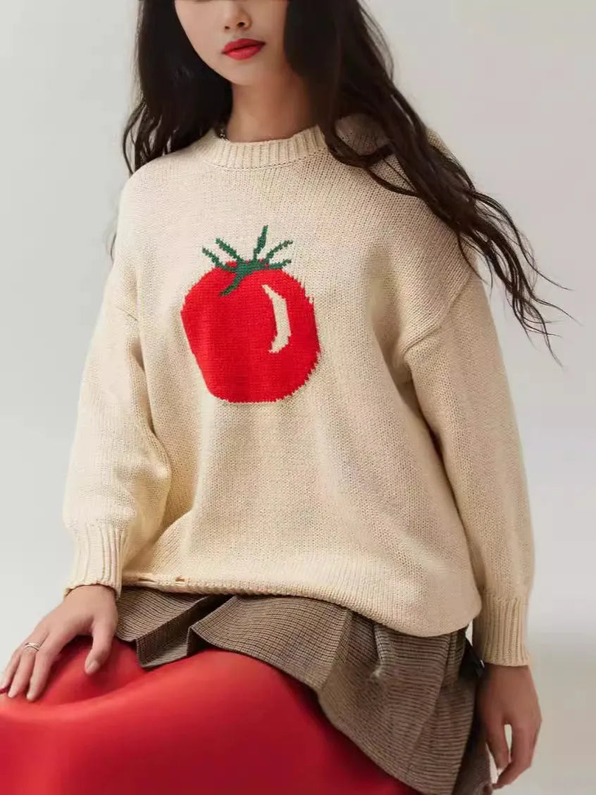 Women's loose-fitting round neck acrylic sweater with jacquard knit texture in a beige colour.