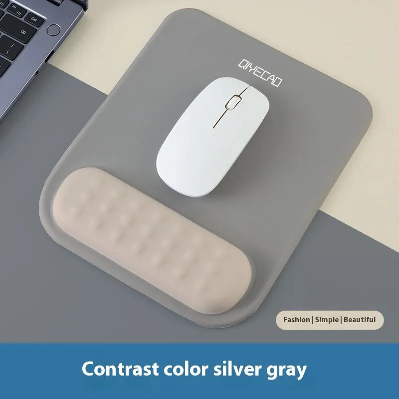 Ergonomic mouse pad with built-in wrist rest in various colour options on a desk