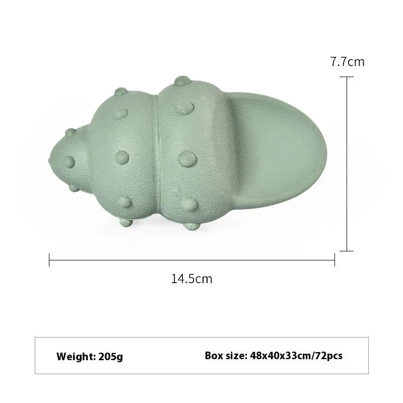 Blue and green rubber dog toys shaped like conch shells and starfish with shark texturing