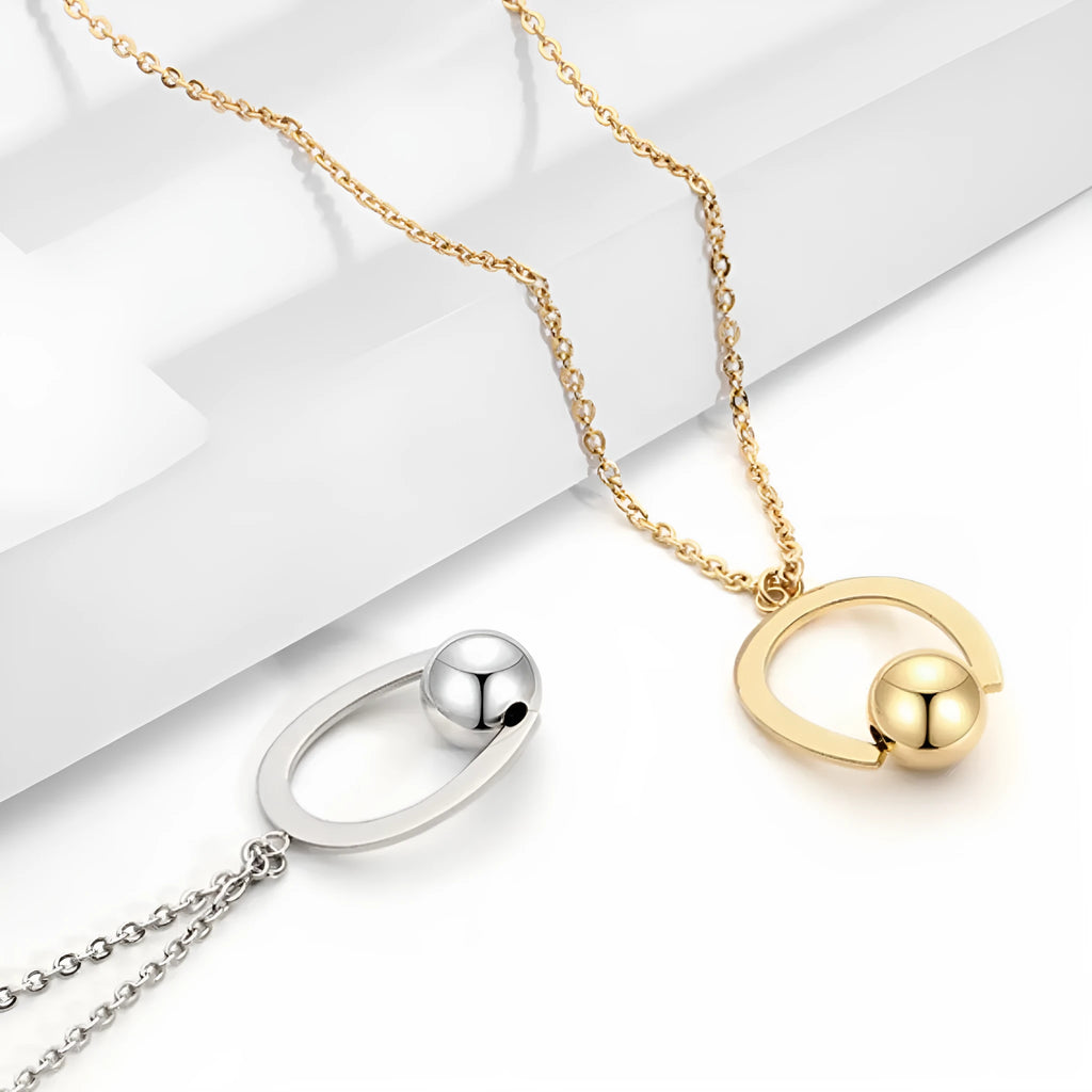 Adjustable stainless steel necklace with geometric pendant on cross chain