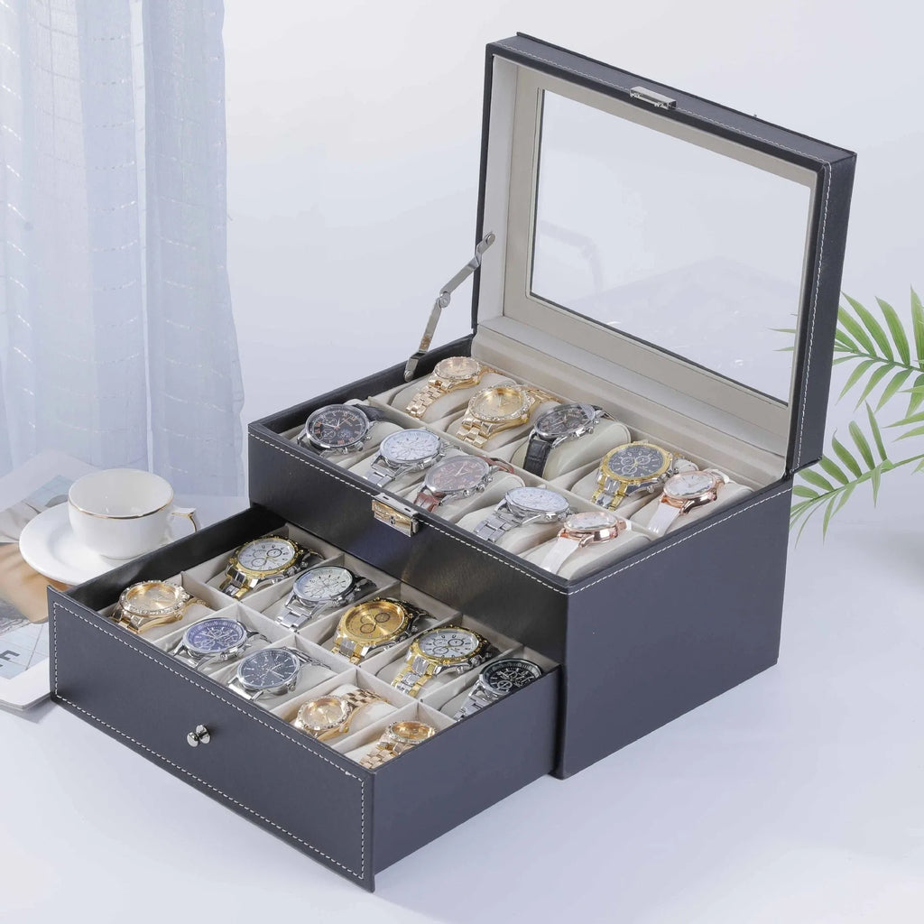 Grey high-grade leather watch storage box with a transparent see-through lid on a wooden surface.