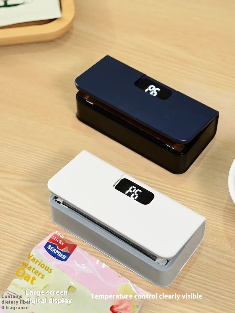 Small portable mini sealing machine in white or blue colour for heat sealing plastic food bags