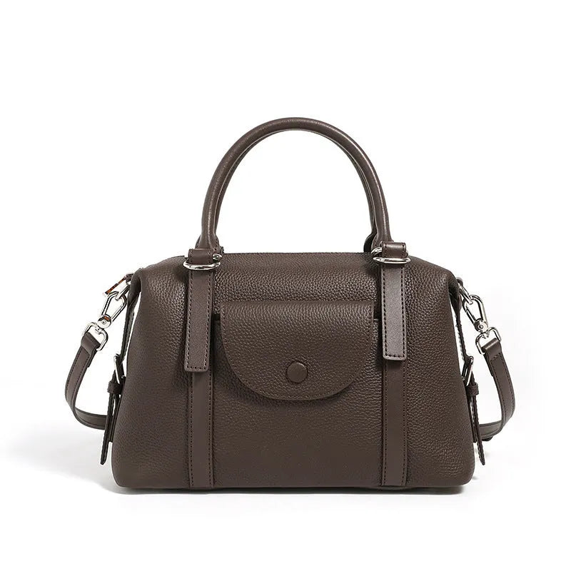 Genuine leather street trend ladies handbag with lock detail in black, brown, or elephant grey
