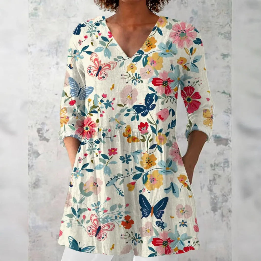 Women's retro style slim fit long-sleeved top with a printed design, shown in one of 12 available colours.