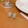 A pair of casual women's earrings with thick gold plating in a choice of silver, gold, or rose gold colour.