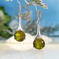 Women's olive green topaz coloured drop earrings with a simple water drop shape and retro style.