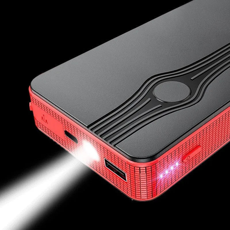 Red K4-E automobile emergency starting power supply and jump starter unit with data cable.