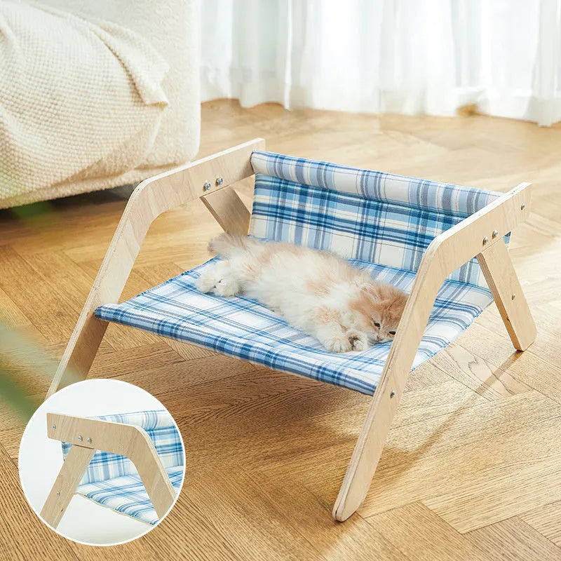 Wooden frame elevated cat bed with cloth hammock in beach chair design for indoor cats