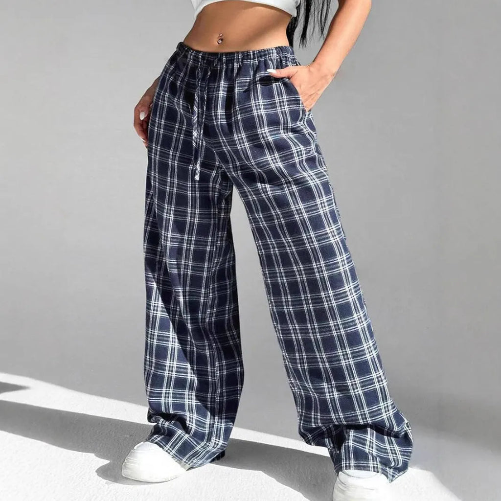 Women's loose fit plaid trousers with drawstring waist and side pockets in red colour