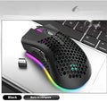 Hollow shell luminous wireless gaming mouse in cyan colour with USB receiver