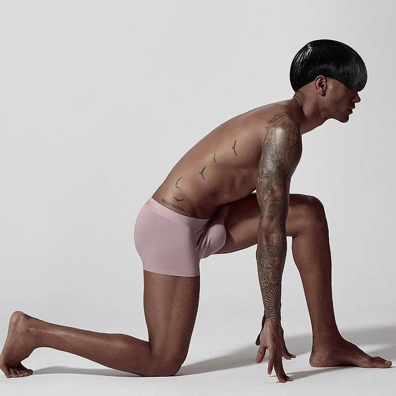 Green seamless modal men's mid waist underwear laid flat