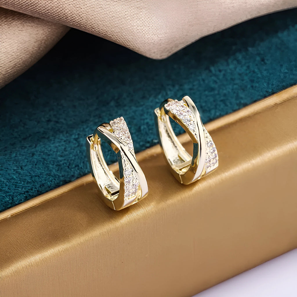 Geometric copper earrings with 14K yellow zircon finishing, showing architectural jewellery design