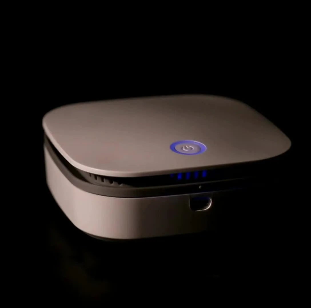 White compact USB negative ion air purifier for car cabin use