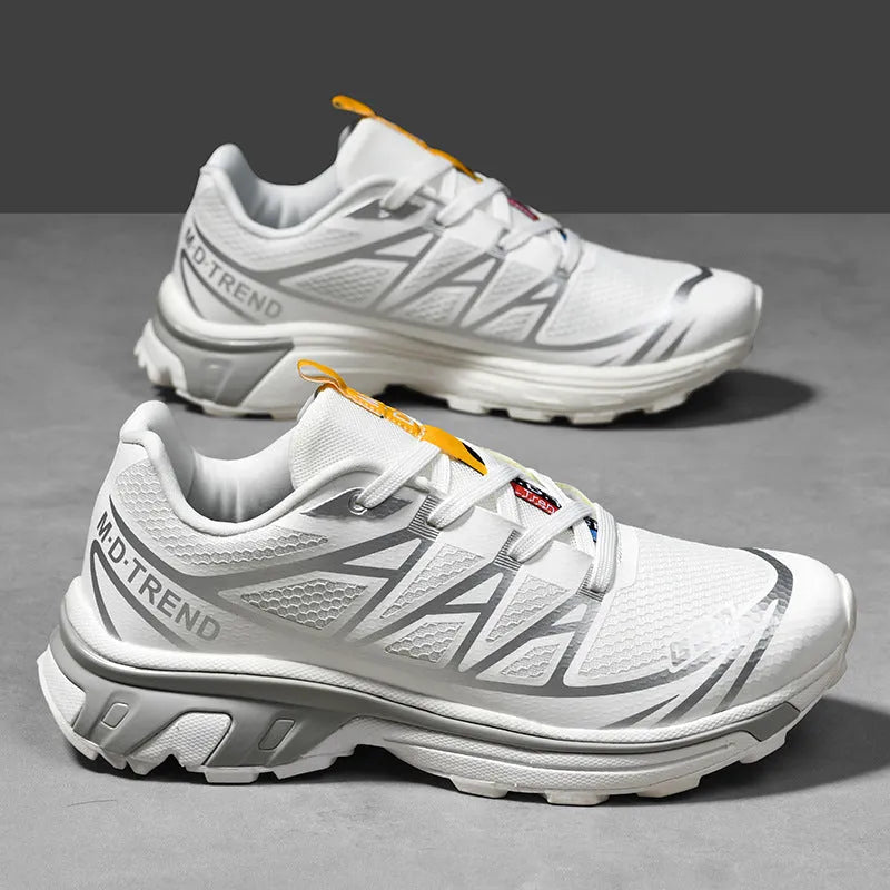 Unisex low-top lace-up leisure hiking shoes in a sport style with a round toe and flat rubber sole.