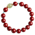 Purple Gold Sand cinnabar and Hetian jade bead bracelet with geometric ellipse shapes on a wrist.