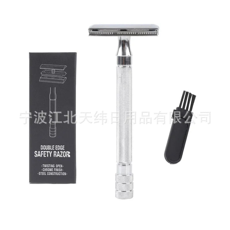 Traditional manual shaving kit showing a metal safety razor and a shaving brush on a dark background.