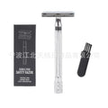 Traditional manual shaving kit showing a metal safety razor and a shaving brush on a dark background.