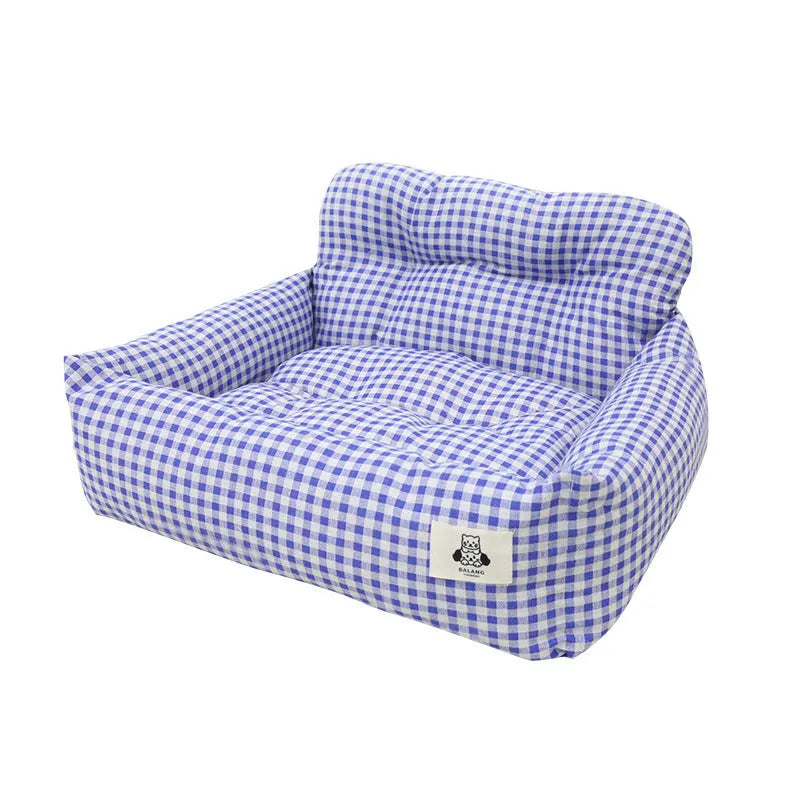 Grey and blue plaid cloth dog nest for car travel, shown in small and large sizes.
