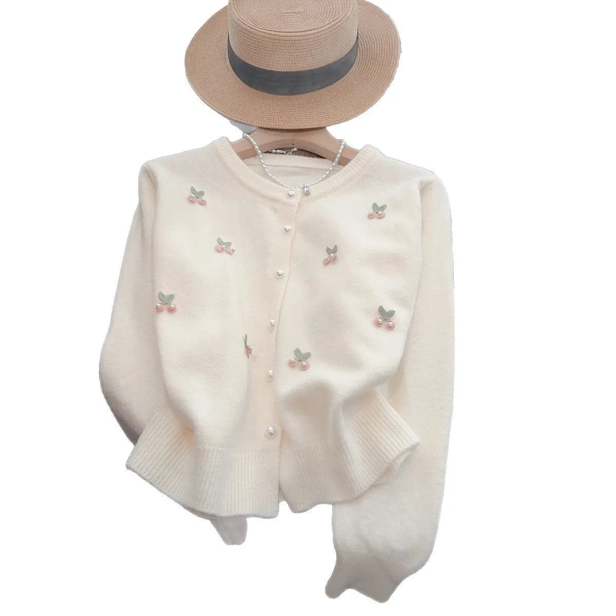 Women's soft pink cashmere blend cardigan coat with round neck, beaded detail, and slim fit.