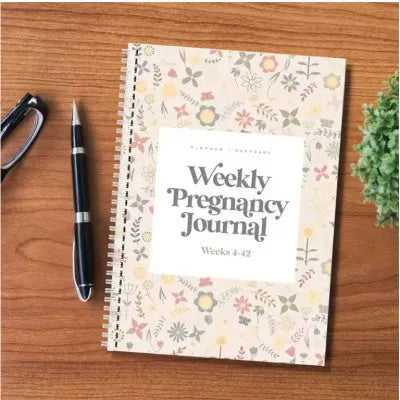 A5 Pregnancy Weekly Diary Notebook open on a page, showing weekly tracking sections.