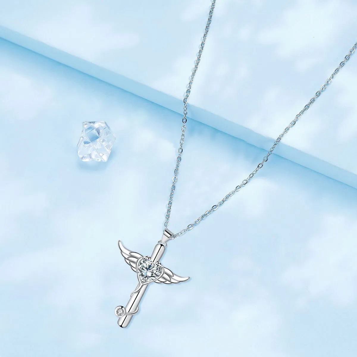 Stethoscope necklace with wings cross pendant on 45cm chain, available in white diamond or red diamond colour options