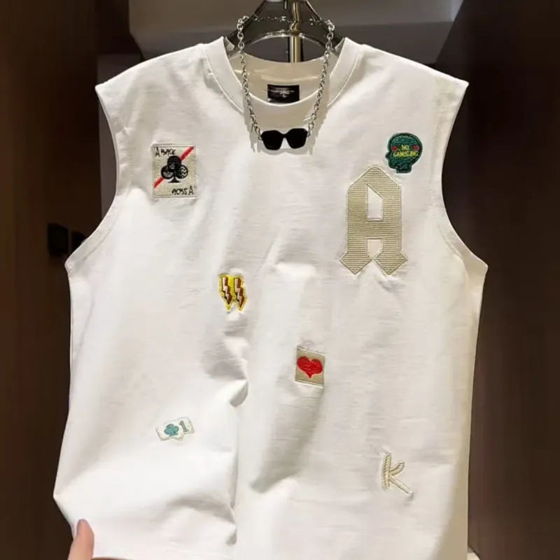 A man's white cotton sleeveless vest with a cartoon graphic print, shown in a loose fit.