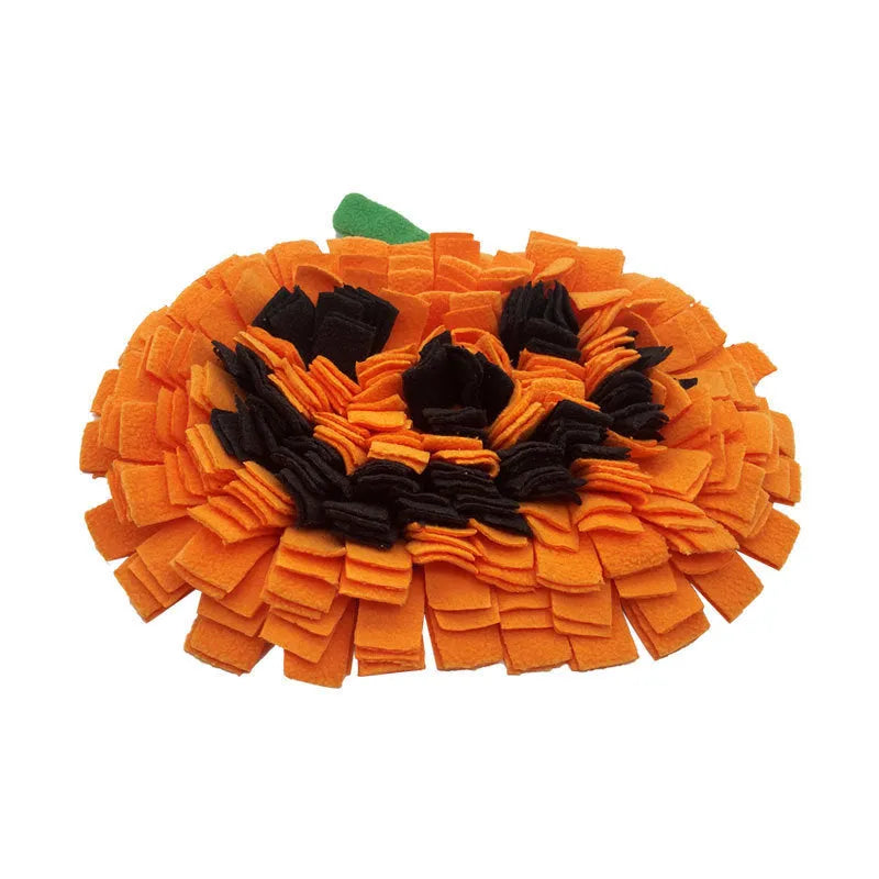 Orange pumpkin-shaped pet smell mat made of polar fleece for dog training and slow feeding.