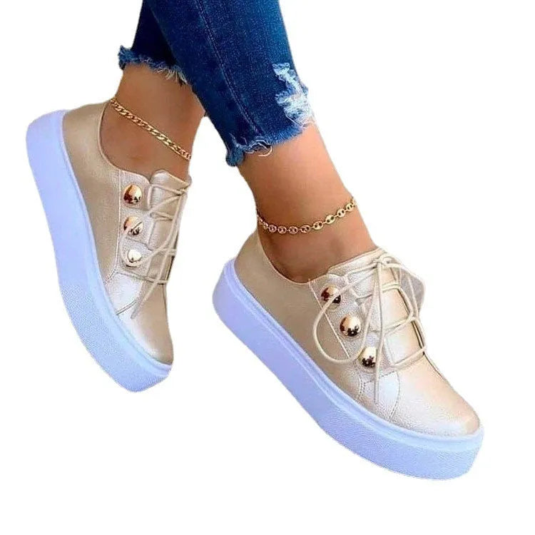 Women's white casual lace-up flats sneakers with rivet detailing and round toe