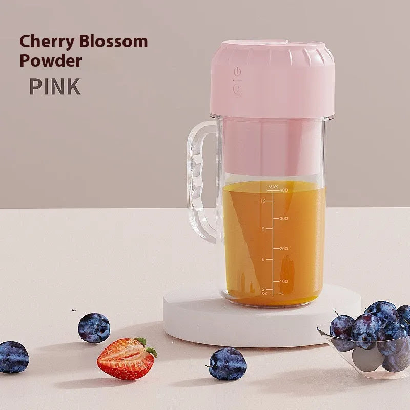 Portable USB juicer in cherry blossom pink or avocado green with multiple blade options