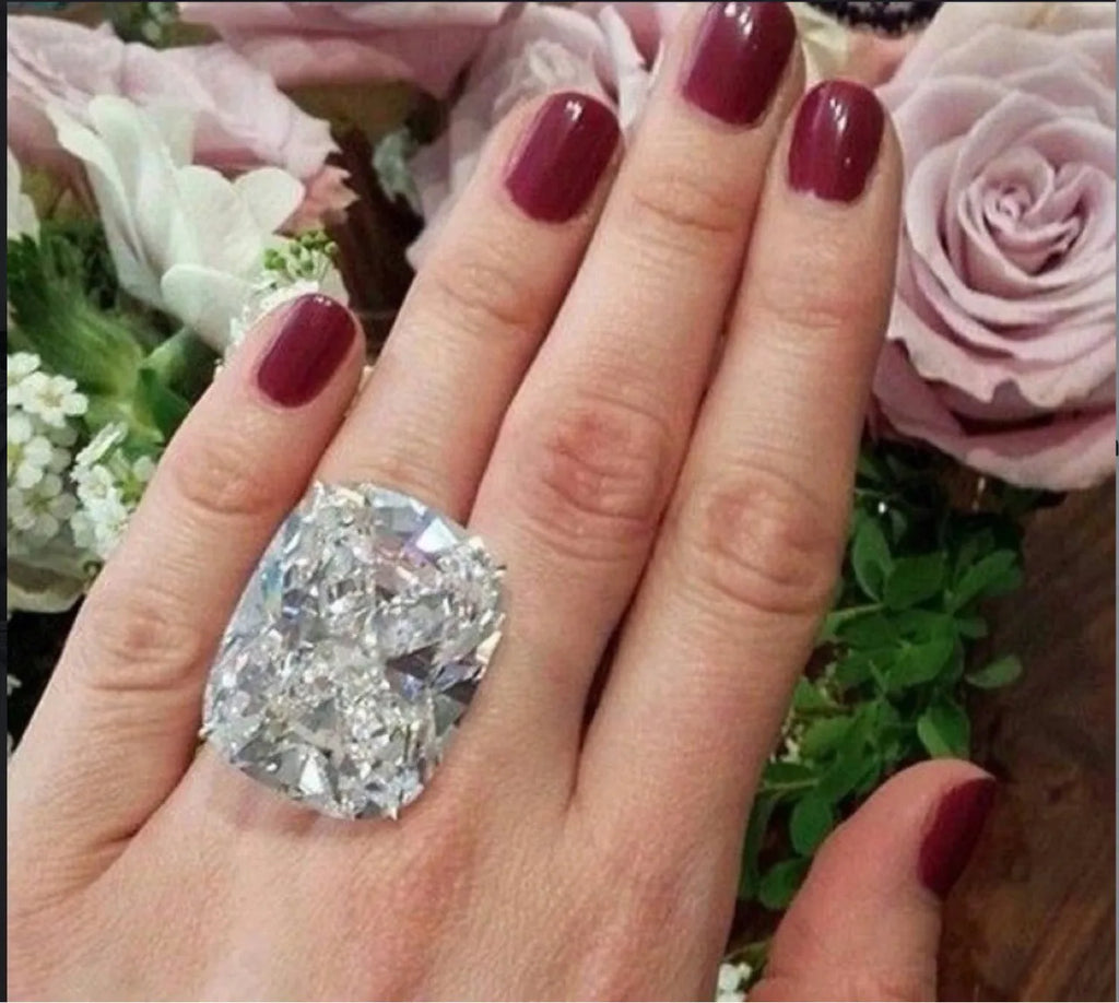 Women's white gold colour square ring with geometric design and inlaid diamond detail