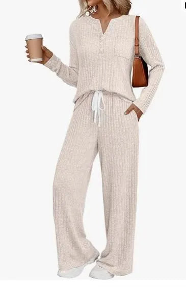 Women's V-neck striped knit long coat in light grey with long sleeves and pockets.