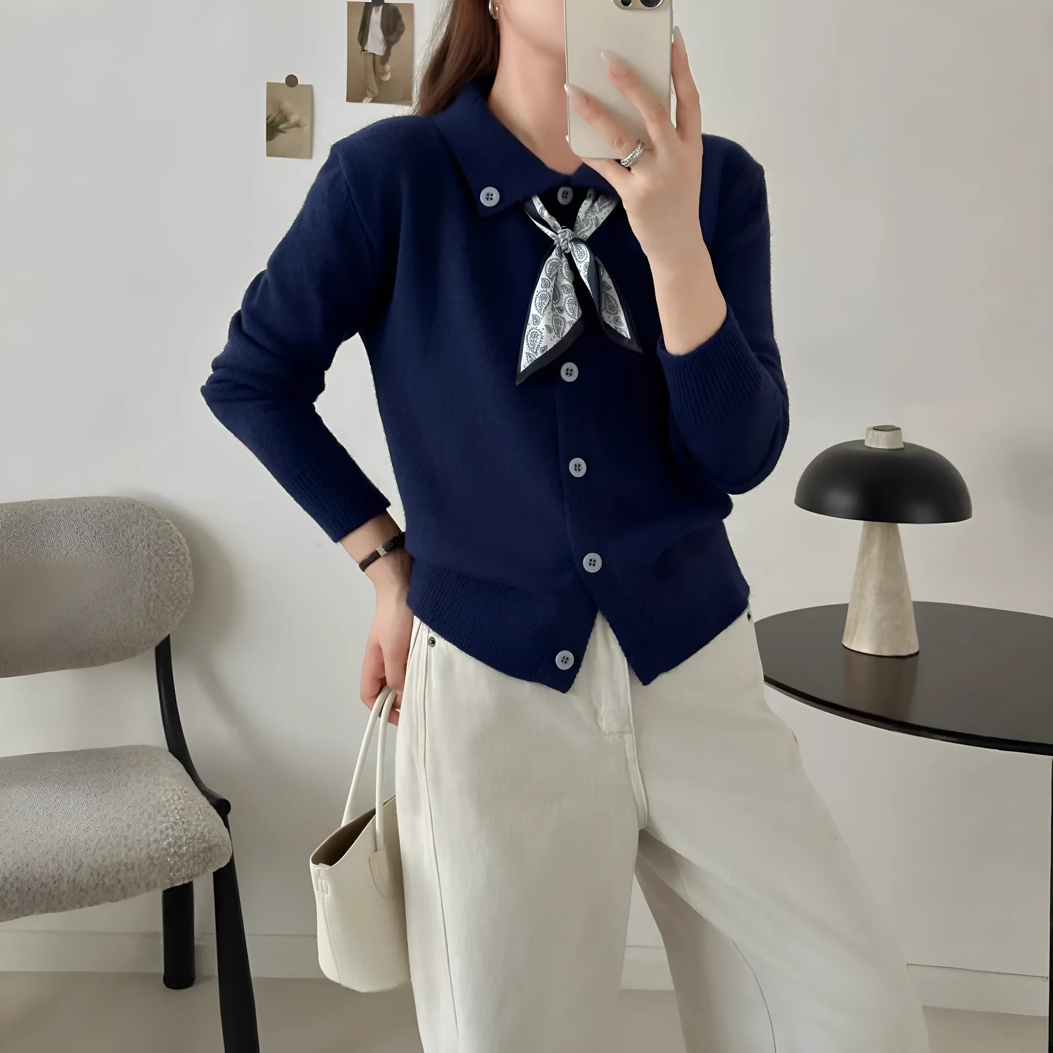 Milky white lazy fashion lapel scarf cardigan sweater with splicing detail and long sleeves.