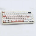 Dessert Cat cartoon themed MOG round key cap set for mechanical keyboards on a white background.